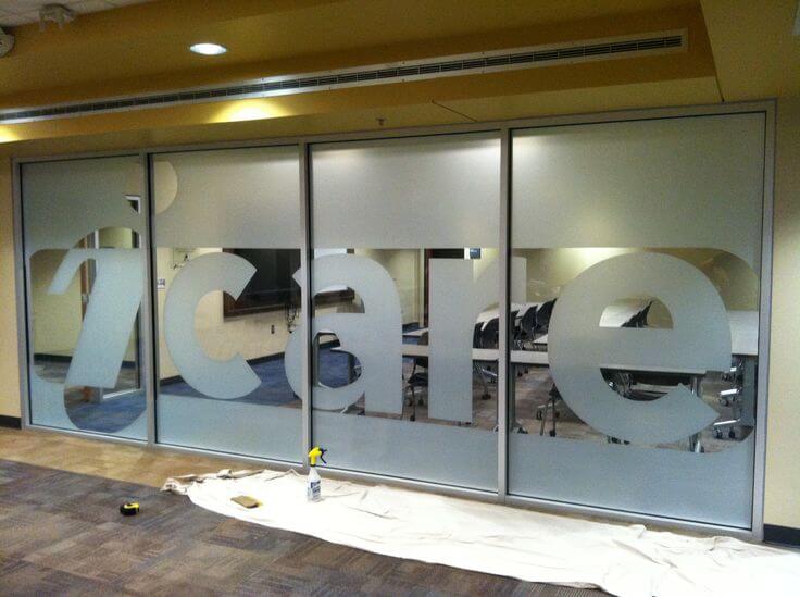 Frosted window film cut (1), large, text, logo, in, frosted, film, on, glass