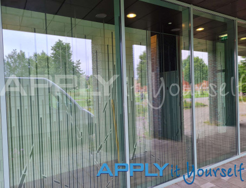 Transparent window film, custom line design, reeds, design across multiple windows, apartment building, outside view